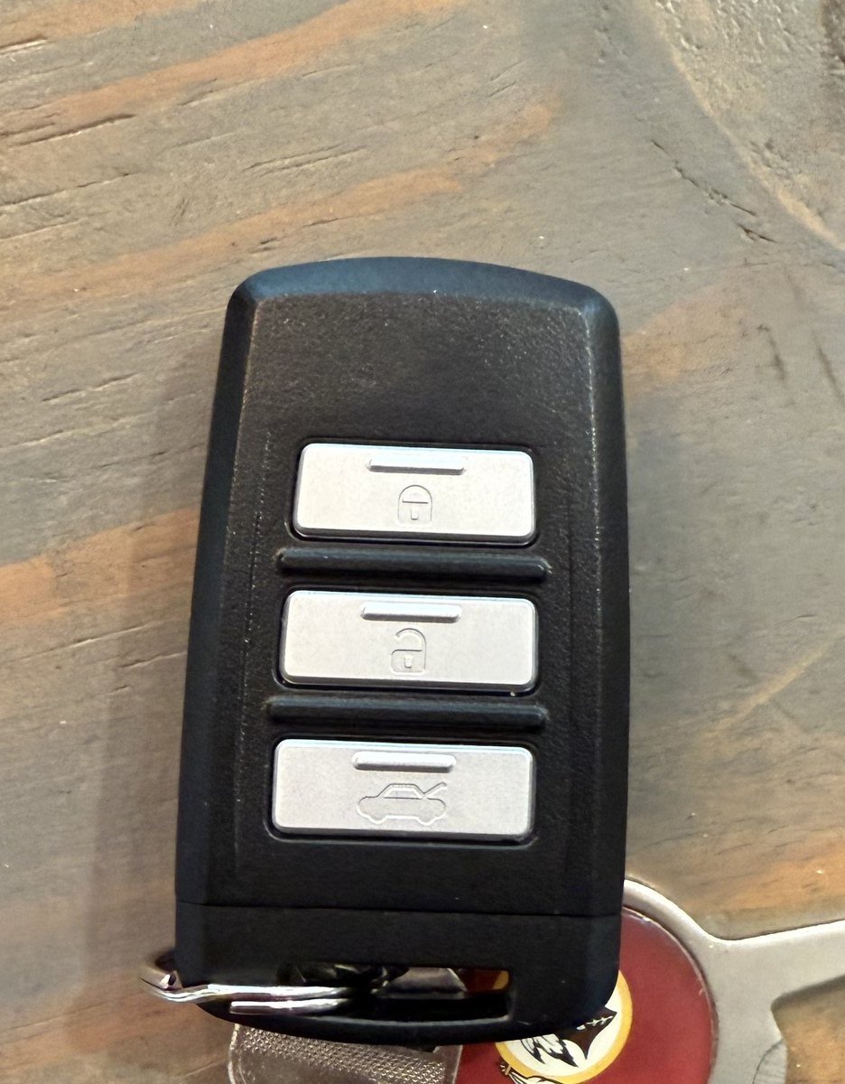 A covert audio recording device concealed inside a car key fob housing, of the type found during a TSCM bug sweep
