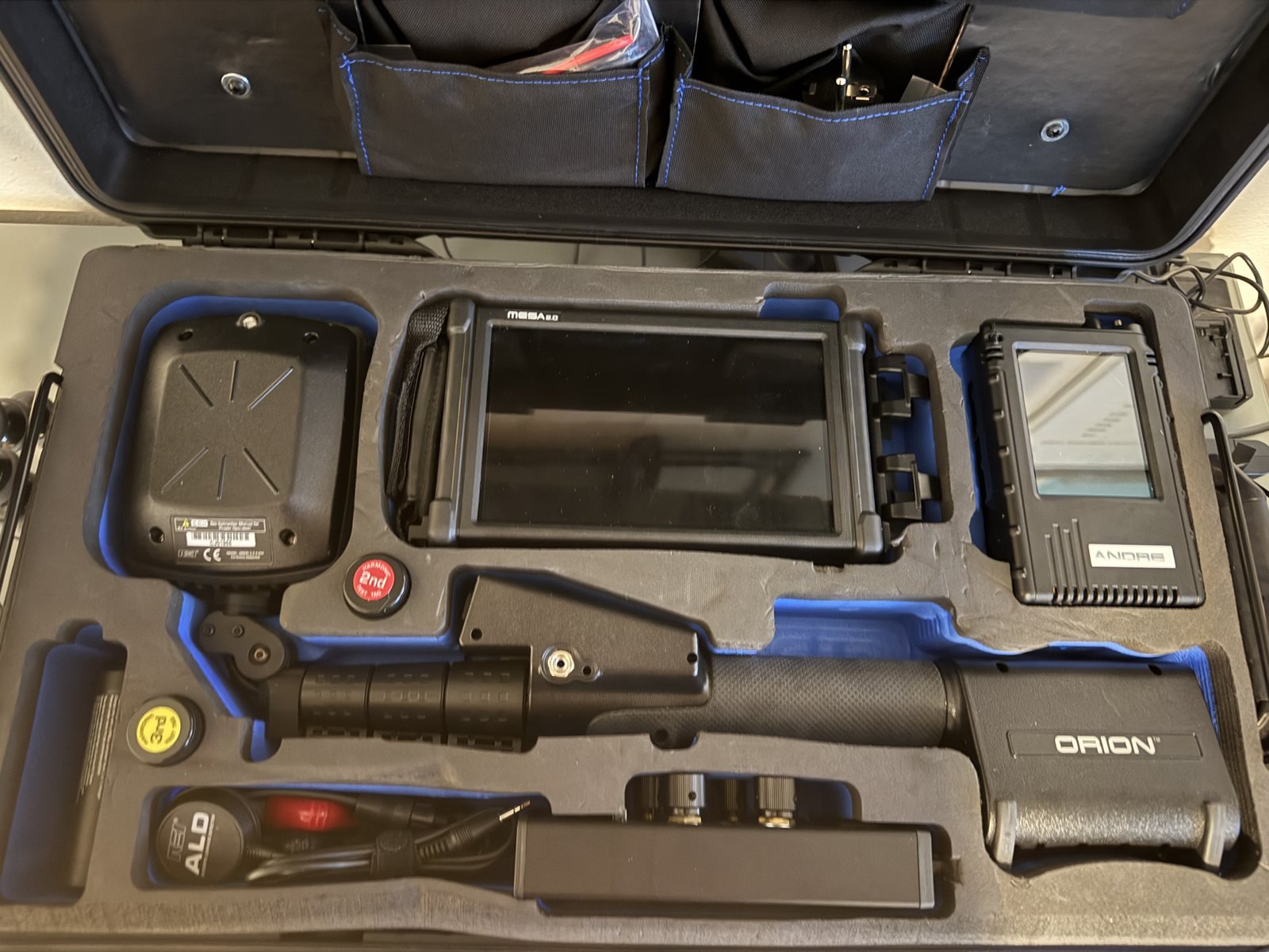 REI Orion technical surveillance countermeasures equipment laid out in its case, including the Orion non linear junction detector, ANDRE near field receiver and MESA spectrum analyser