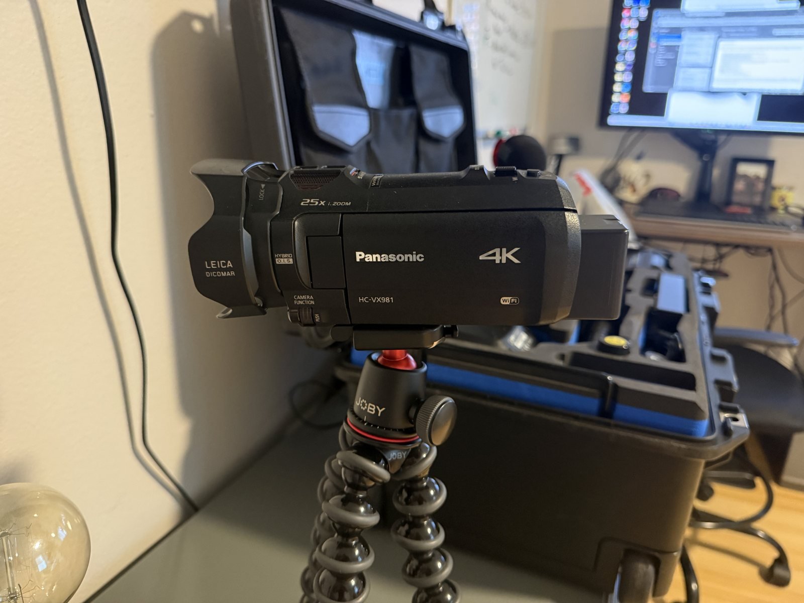 A 4K camcorder on a flexible tripod, the configuration used for vehicle based surveillance by Insight Investigative Group