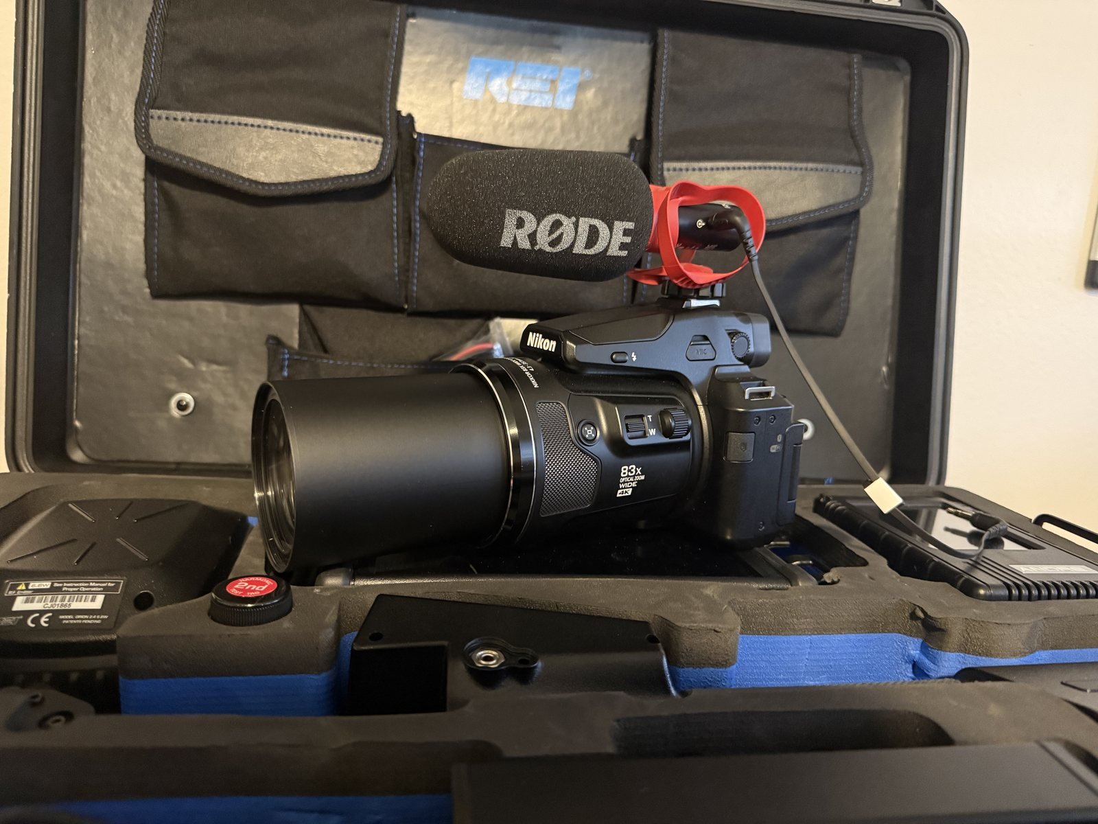 An 83x optical zoom surveillance camera with directional microphone, packed in the sweep kit case