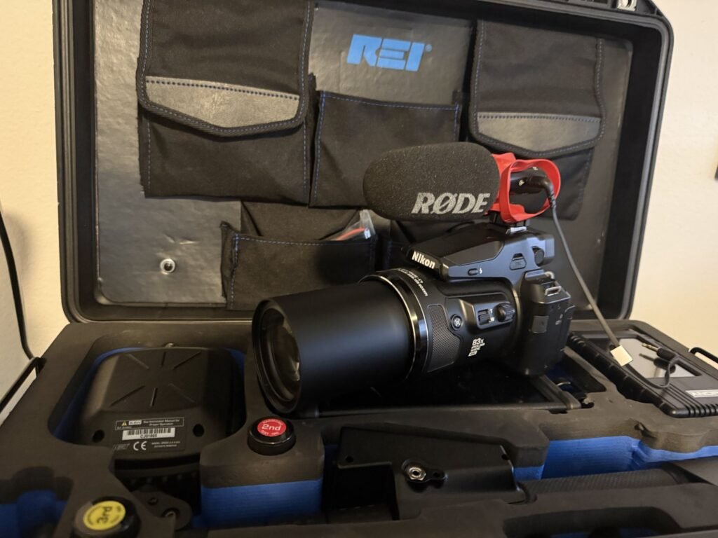 A long lens surveillance camera with a directional microphone, packed in the equipment case used by Insight Investigative Group
